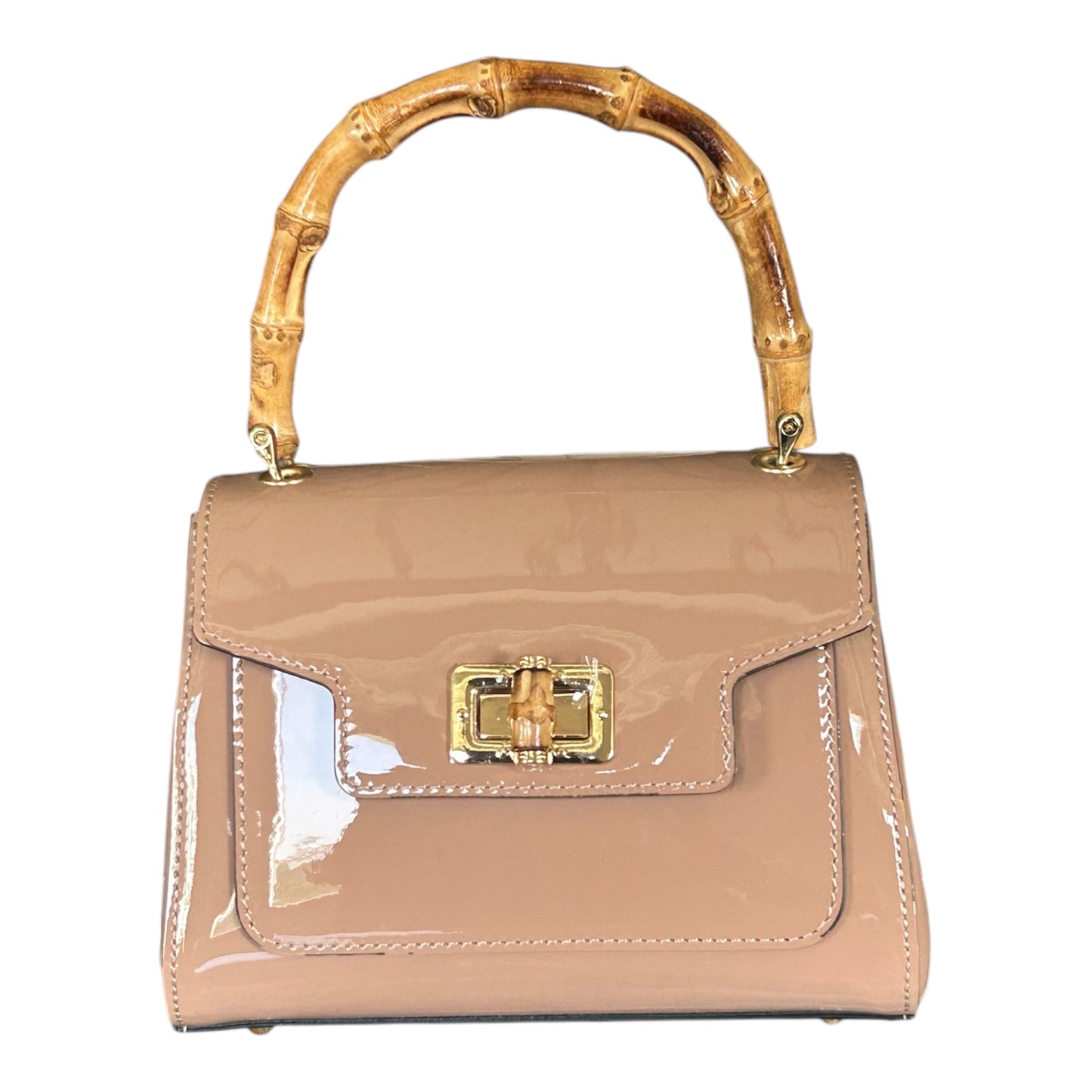 Borsa in pelle con manico in bambù.